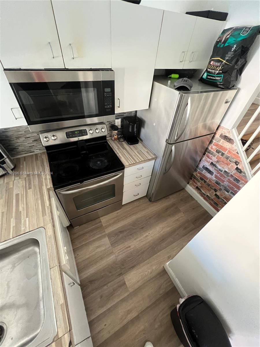 NAPOLI GARDENS AT CORAL S - Residential