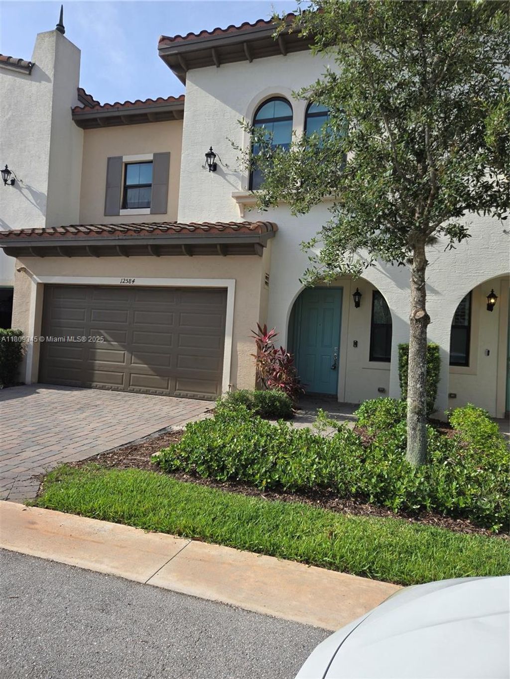 Photo of 12584 NW 32nd Mnr #12584, Sunrise, FL 33323 (MLS # A11809345)