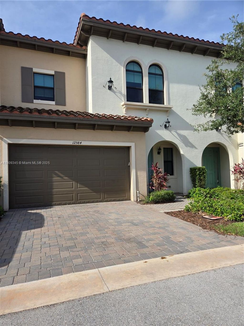 Photo of 12584 NW 32nd Mnr #12584, Sunrise, FL 33323 (MLS # A11809345)