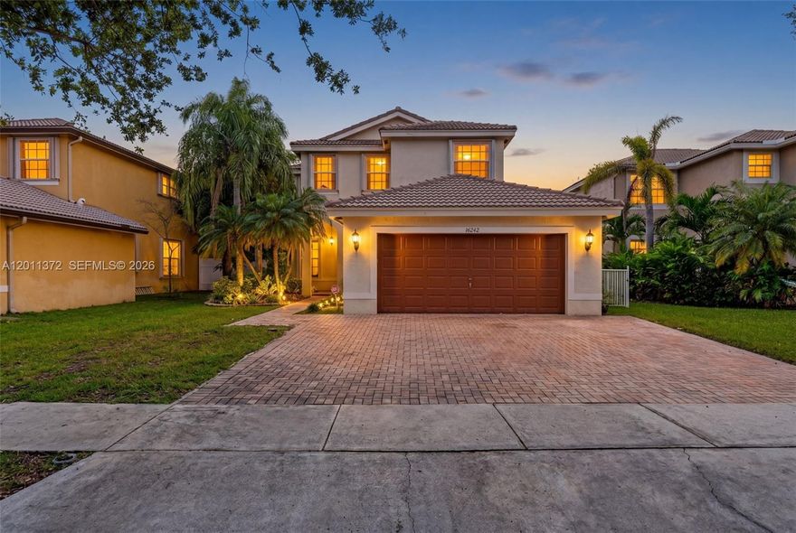 Located in the gated Silver Isles community of Miramar, this spacious 5-bedroom plus den, 3-bath two-story home offers a versatile and well-designed layout. The second floor features the primary suite along with three additional bedrooms. The primary suite includes a sitting area, two large walk-in closets, a Roman tub, and a separate shower. A first-floor bedroom and full bath provide added flexibility for guests, work, or other needs. Accordion shutters offer added convenience and peace of mind. Enjoy your own private outdoor retreat with a pool and fenced yard, ideal for relaxing or entertaining. Low HOA includes gated entry, pool, fitness center, parks, and internet. Conveniently located near shopping, dining, and major roads.