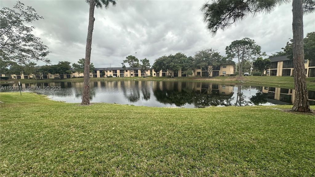 Photo of 145 NW 93rd Ave #101, Pembroke Pines, FL 33024 (MLS # A11937015)