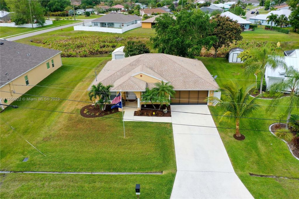 Photo of 6890 NW Hogate Cir, Port Saint Lucie, FL 34983 (MLS # A11356922)