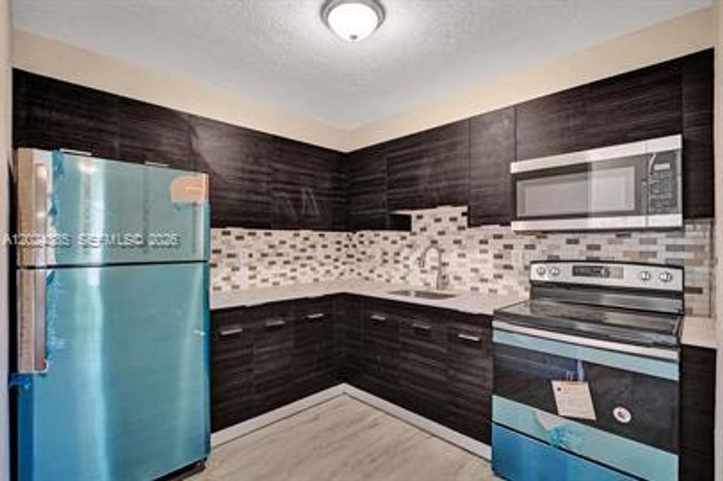 Photo of Pompano Beach, FL 33069 (MLS # A12024385)