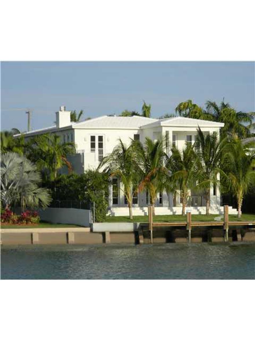 New construction. Corner-Waterfront. Pristine, tropical, modern. 4,922 sqft Five beds up with lovely terraces, one bed down. 5 full & one half bath. High ceilings. Abundance of large windows create luminous rooms. Full cabana bath, outdoor summer kitchen,  sparkling pool, covered patio, seawall and dock. Marble floors, formal dining room, exquisite lighting fixtures, 2 car garage, eat-in kosher kitchen. Great sunsets! Prestigious town of Surfside with A+ schools, new community center. Walk to the ocean!