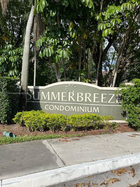Photo of 9999 Summerbreeze Dr #413, Sunrise, FL 33322 (MLS # A11877335)