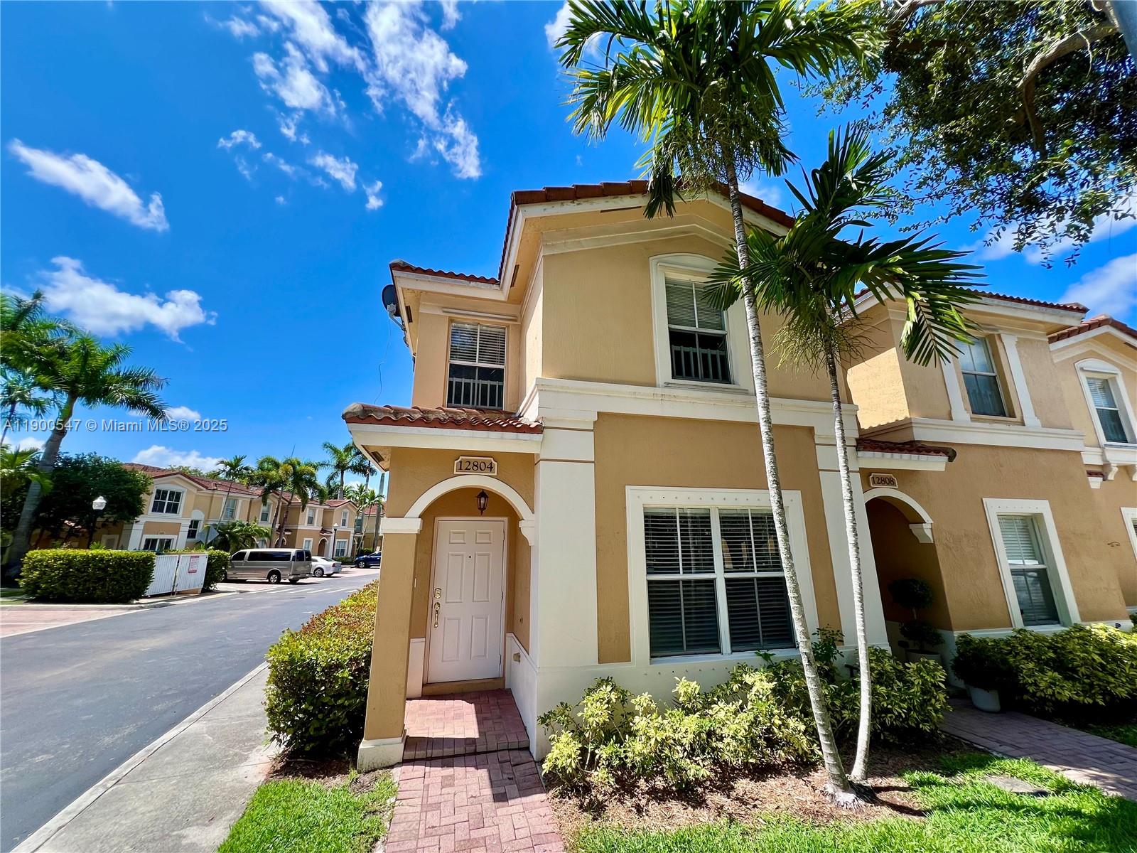 Beautifully updated 3BR/2.5BA corner townhome in the desirable gated community of Melrose Point! This spacious 1,697 sq. ft. residence features a brand-new kitchen with new countertops, newer stainless steel appliances, and modern light fixtures. The entire home has been freshly painted with new window screens and matching white blinds throughout. Upstairs, the primary suite offers a private balcony and walk-in closet. Enjoy light grey wood laminate flooring in all bedrooms and a white wood staircase for a clean, modern look. Bright, airy living and dining areas plus a large family room off the kitchen make this home perfect for entertaining. Community amenities include 24-hour security patrol, fiber internet & cable, a pool, gym, playgrounds, and plenty of guest parking. Move-in ready!