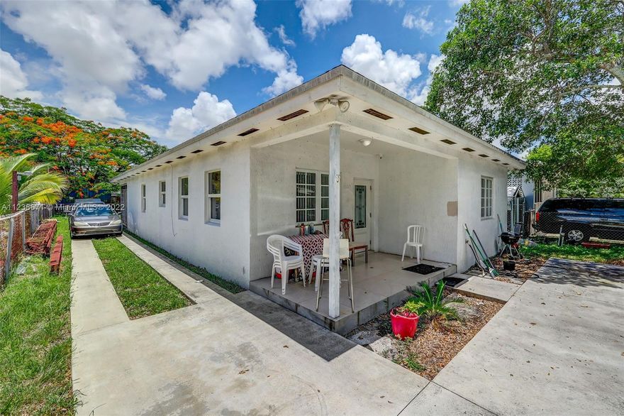 New house built in 2021 has 5 bedrooms 3 bathes, marble floors, wood cabinets, granite counter tops, Sub Zero Refrigerator, marble guest bath and marble master with jacuzzi tub, high ceilings with LED high hats through out, impact windows and doors, two tankless water heaters, 4 ton A/C with 2 electric meters and a rental income of $3600 a month. The original house which is in the back has approximately 469 sq. ft. with a 1-1. Front house which is 4-2 has approximately 1650 sq. ft. All dimensions must be confirmed.
