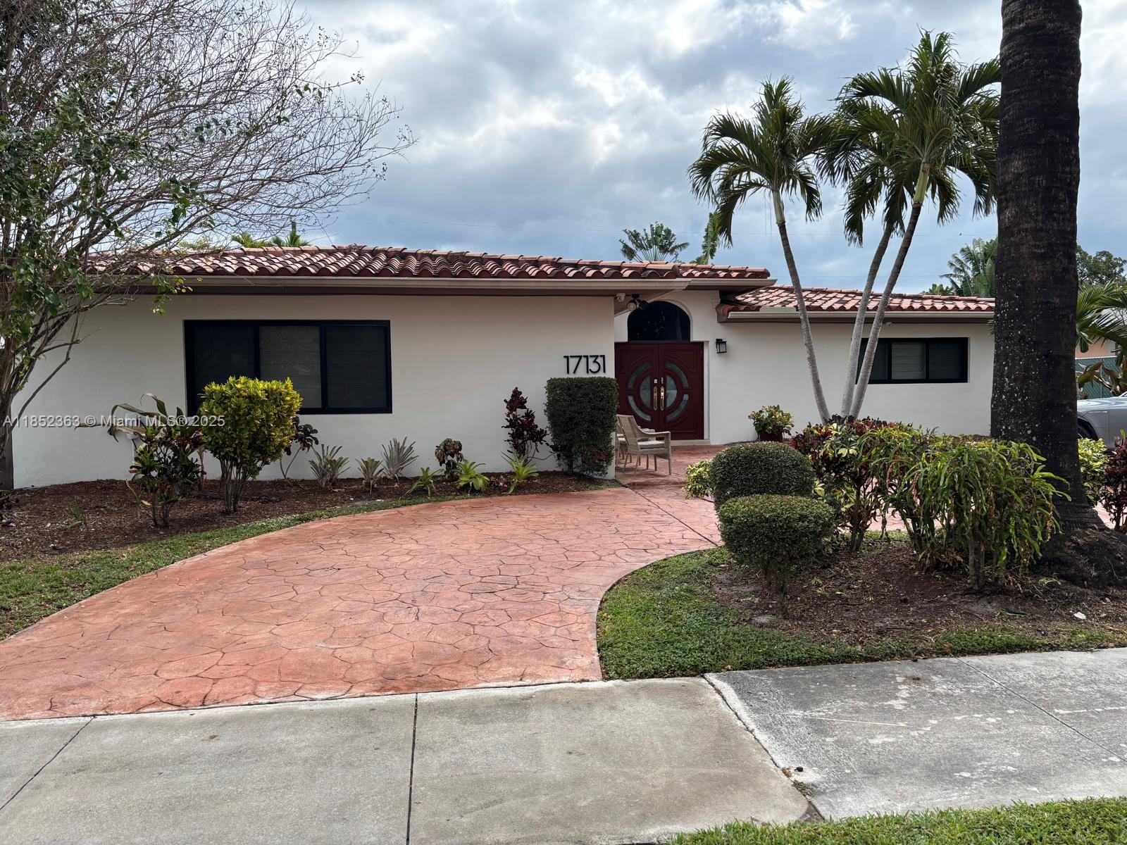 This beautifully updated 5 bedroom, 4 bathroom home offers over 4,000 sqft of luxurious living space. Featuring 24x24 marble flooring throughout the main areas. The newly renovated kitchen boasts 2024 Sub-Zero and Wolf appliances, including a 36x36 refrigerator and freezer, two sinks, an Insinkerator disposal, and a stainless steel hood. The quartz countertops and custom cabinetry make this kitchen both stylish and functional, perfect for cooking and entertaining. Gorgeous Spanish title roof.
The home has been freshly painted throughout, with all-new moldings, providing a modern, sophisticated atmosphere. Every window has been replaced with hurricane impact glass for enhanced safety and energy efficiency. All electric has been fully updated to 2024 standards, offering peace of mind.