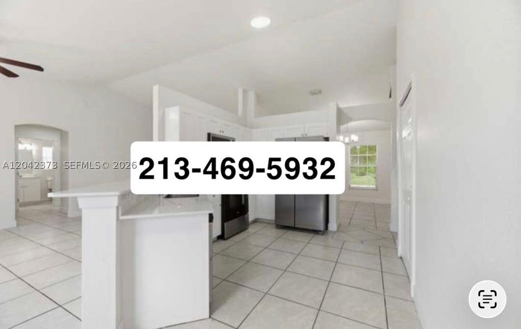 Photo of 221 SW Amesbury Ave, Port St Lucie, FL 34953 (MLS # A12042373)