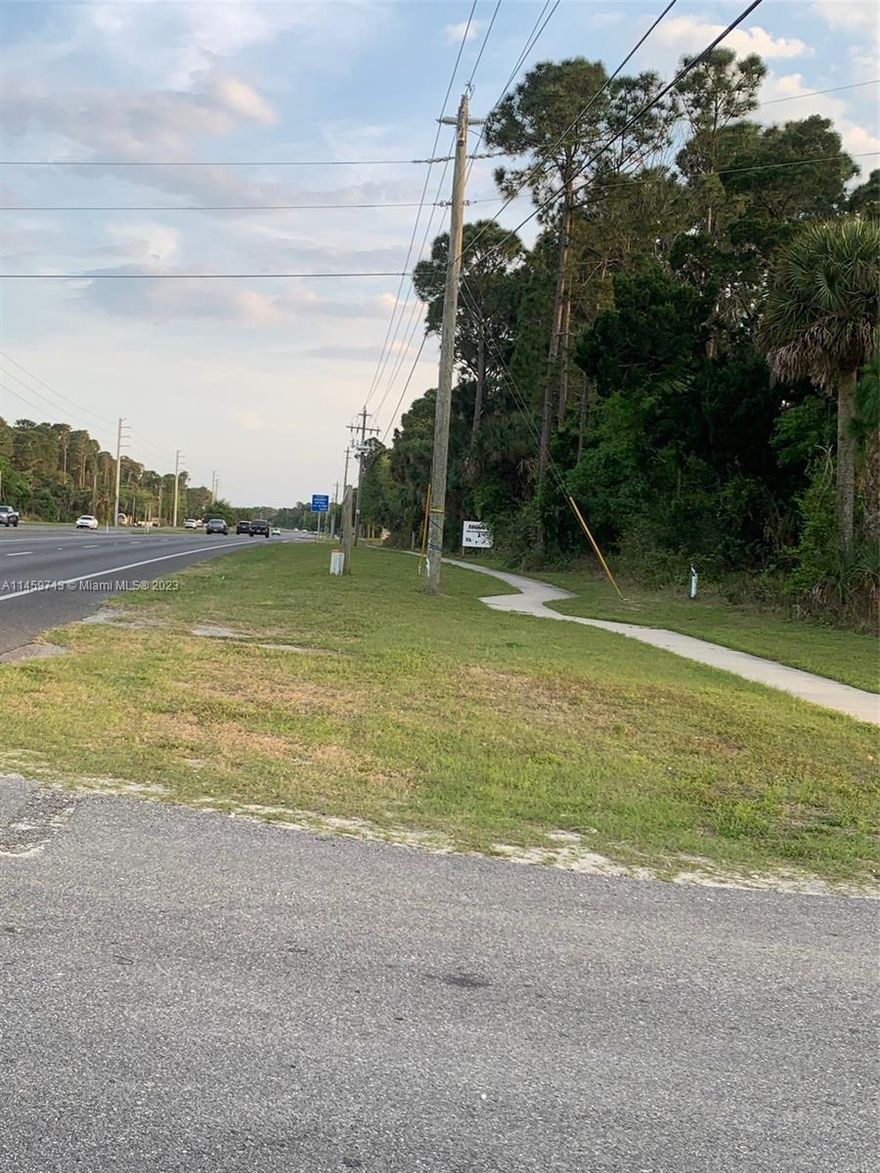 3 adjacent parcels, 140' frontage on US-1, traffic count of 15,000/day. Volusia County bus stop next to it. Adjacent to Fitness Gym to the north, Baptist Church to the south. Fast growing community, steps to Walgreens, Publix, Burger King, houses of worship, etc. Near Indian River & beaches. B-4 zoning allows many commercial uses, retail, offices, medical, bank, restaurant, daycare, warehouse, self-storage/warehouse, car wash, etc. Under Volusia County legislation, 2 parcels zoned B-4, 1 parcel zoned residential R-3. Volusia County desires annexation to City of Edgewater. Annexation is an opportunity to request rezoning from City to fit buyer's needs, i.e. rezoning to R-5 for up to 35-unit multifamily development. Potential to acquire additional lot(s) for larger development project.