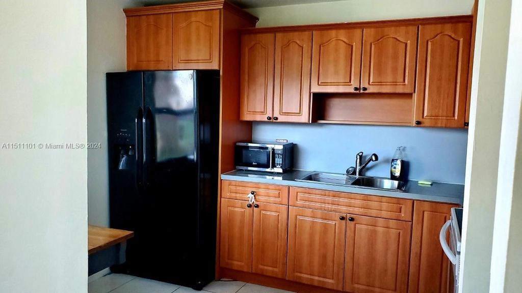 Photo of 10024 SW 14th St, Pembroke Pines, FL 33025 (MLS # A11511101)