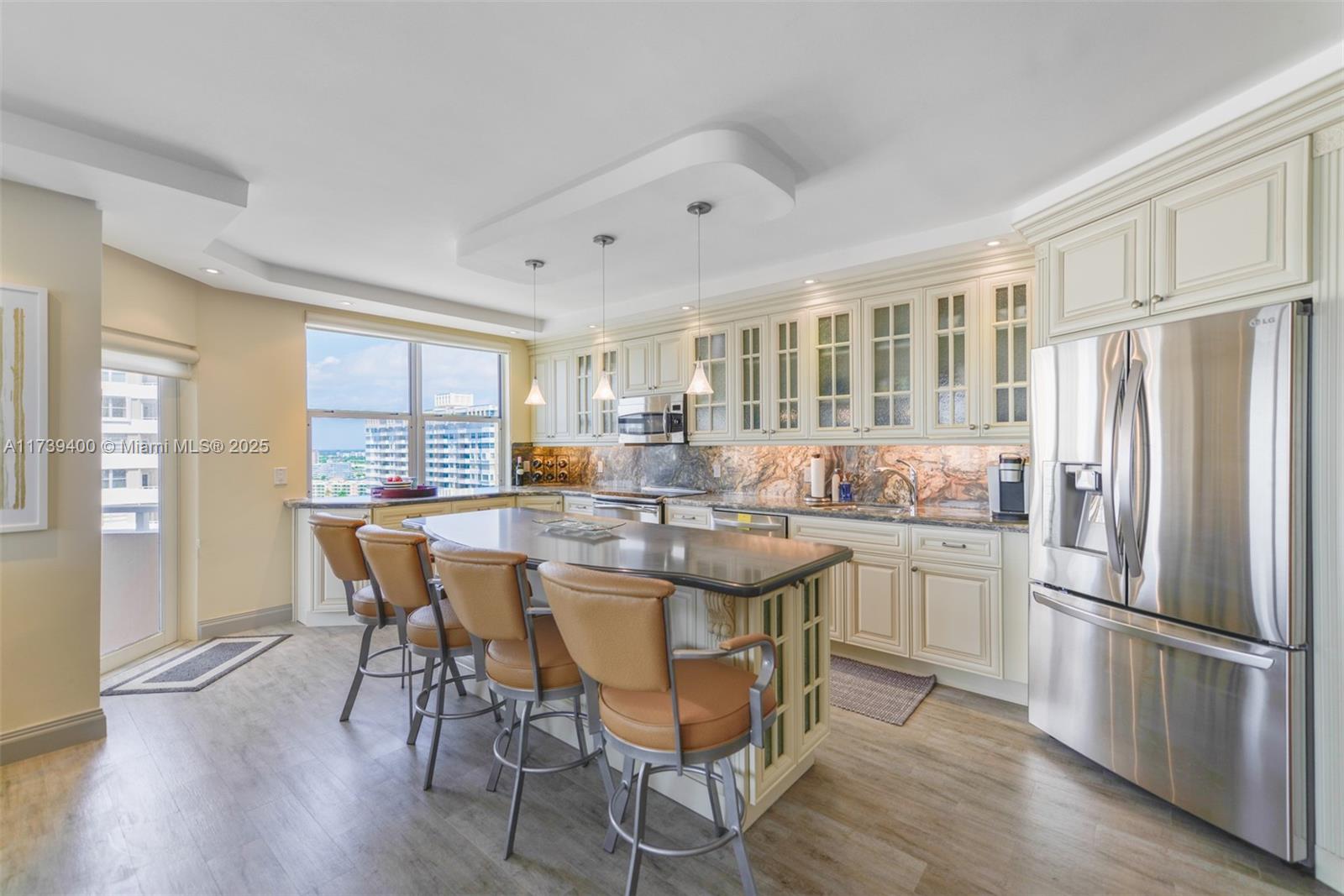 ELEGANT 3-BEDROOM CORNER UNIT in the The Hemispheres. Fully remodeled with refined finishes, this residence features an open kitchen and breathtaking views from every room. Designed for both comfort and sophistication, the spacious layout is bathed in natural light, creating a serene retreat by the sea. Enjoy resort-style amenities, including pools, tennis courts, fitness centers, on-site dining, beach access, beach service and more. A rare opportunity to own a luxurious oceanfront corner unit in a premier community!