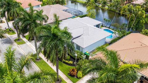 Tiny photo for 11021 Redhawk St, Plantation, FL 33324 (MLS # A12035935)