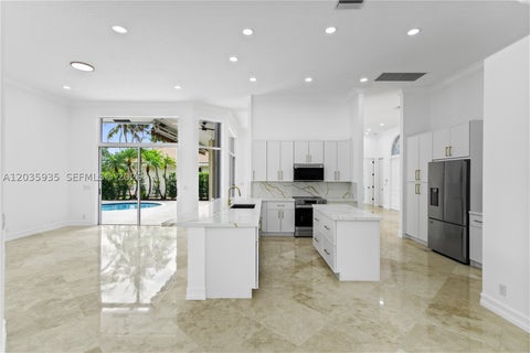 Tiny photo for 11021 Redhawk St, Plantation, FL 33324 (MLS # A12035935)