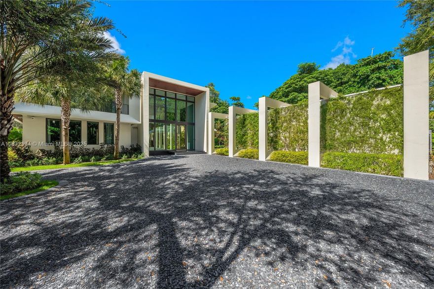 Architecturally striking new contemporary in Journey’s End offers rarity, cachet & grandeur on 1.728 acres with 24-hr guard gate, marina w deeded boat slip and 2 tennis courts. One of only 18 estates in this exclusive enclave, enter through walls of glass to a floating-staircase foyer & soaring 23’ ceilings, framing lush park like gardens & enormous resort style pool.  Expansive limestone slab floors seamlessly connect the grand living, dining & family rooms w Snaidero kitchen, complemented by 3 oversized ensuite bedrooms, a media room, powder room & laundry.  Upstairs white oak unifies ethereal primary suite with spa bath, dual vanities, water closets & walk-ins + 3 expansive en-suite bdrms. Detached 4-car garage, 75x25’ pool. Privacy, exclusivity & abundance define this elite estate.