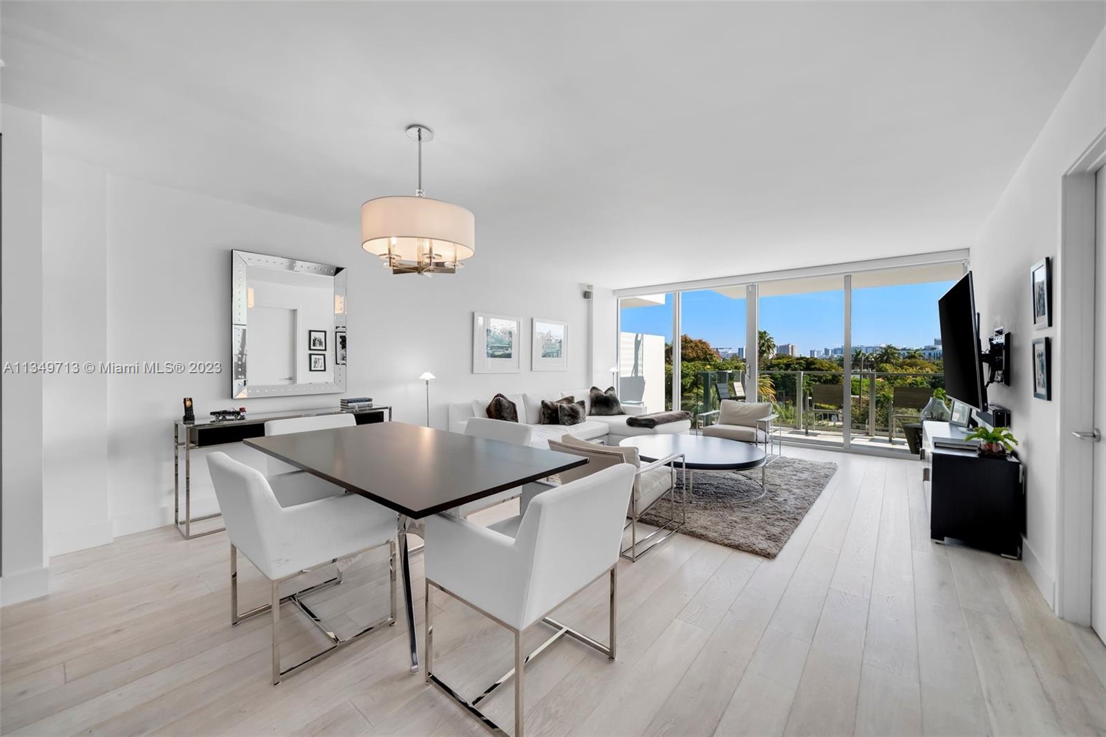Enjoy living in this sought-after turnkey elegant residence at Palau in Sunset Harbour. Be greeted by natural light pouring in through the floor-to-ceiling windows as you enter. The open floorplan brings together the living room, kitchen, and dining area, an entertainer’s dream. The spacious principal bedroom featuring en-suite bathroom boasts double sinks, a bathtub, and a separate shower. This modern, 1,562 SF unit is the epitome of luxury and style, with high-end finishes throughout and a prime location in one of Miami Beach's most coveted neighborhoods. Located in the heart of Sunset Harbor, within walking distance to top restaurants, fine shops, and entertainment.