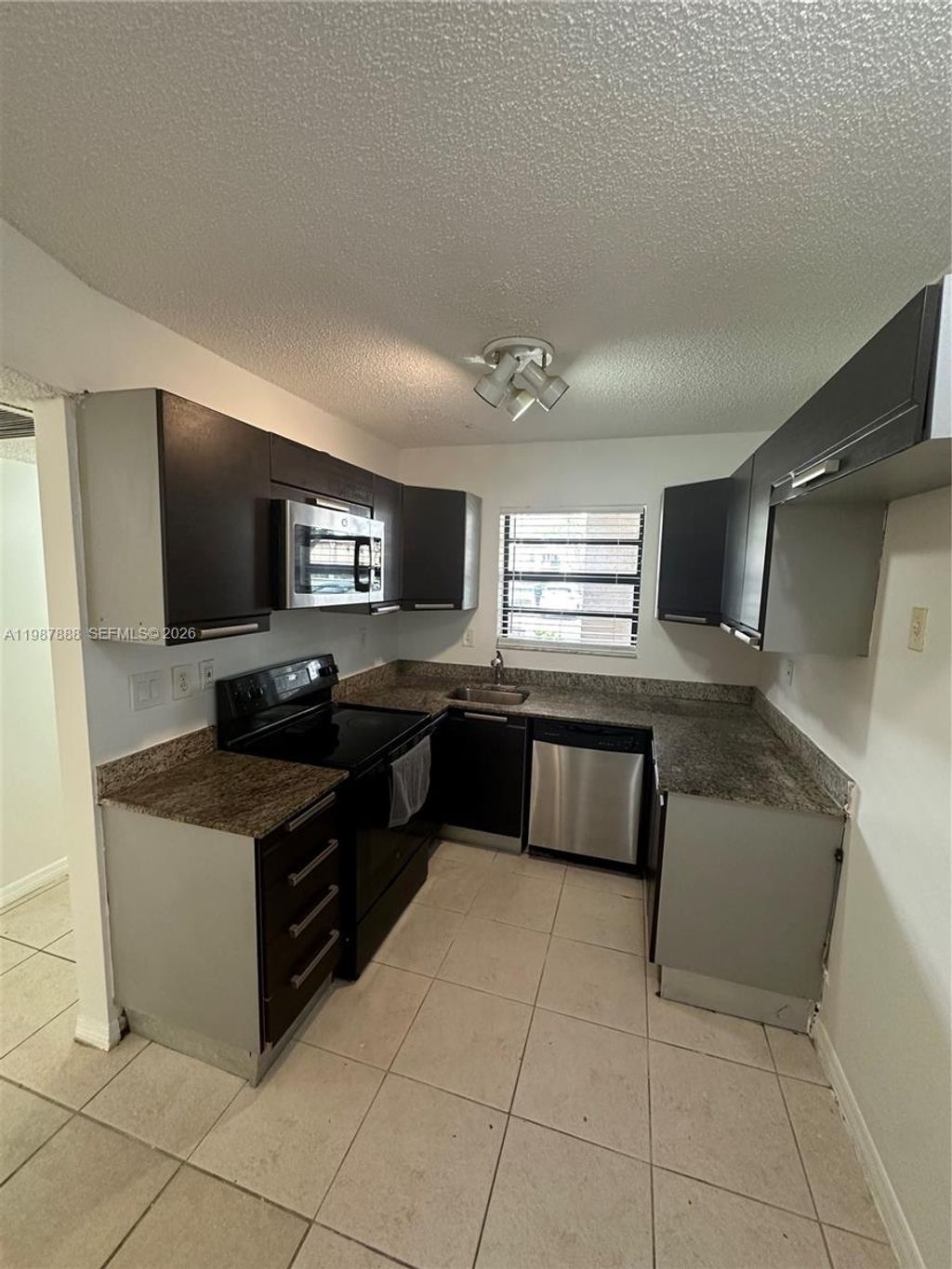 Photo of 11213 Royal Palm Blvd #11213, Coral Springs, FL 33065 (MLS # A11987888)