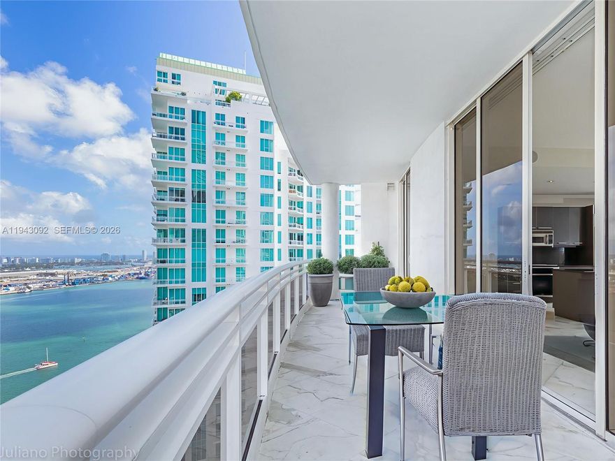 Enjoy breathtaking direct water views from this high-floor, upgraded 2-bedroom, 2.5-bath residence in the iconic Carbonell on Brickell Key. The spacious split-bedroom layout features floor-to-ceiling impact windows, abundant natural light, and a seamless open-concept design. Elevated finishes include renovated spa-style bathrooms, Calacatta Gold marble floors, recessed lighting, refined architectural details, and top-tier appliances. An open balcony showcases stunning Biscayne Bay views for exceptional indoor-outdoor living. Carbonell offers full-service luxury amenities including a two-story fitness center, waterfront pool, sauna, tennis, basketball and racquetball courts, business center, free valet for guests, party room, concierge, and 24-hour security. Ideally located on Brickell’s exclusive private island just minutes from Brickell City Centre and Downtown Miami, with the upcoming Mandarin Oriental further enhancing the island’s value and prestige. An exceptional opportunity for luxury living and long-term investment.