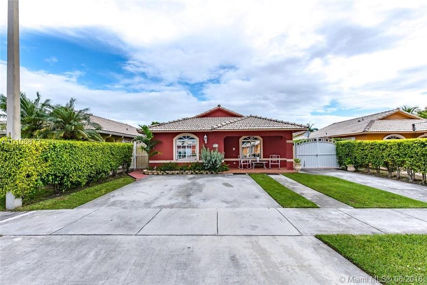 Gorgeous three bedroom, two bath home in highly desired section of Hialeah Gardens. This quintessential HG home boasts an extra large lot with parking for multiple automobiles, completely remodeled two years ago, spacious master suite, crown moldings, LG Stainless Steel appliances, Gas range, High capacity-front loading GE washer & dryer, granite counters, finished front porch with sitting area & expanded driveway, finished patio with tile & aluminum roof with room for entertaining and even a boat.