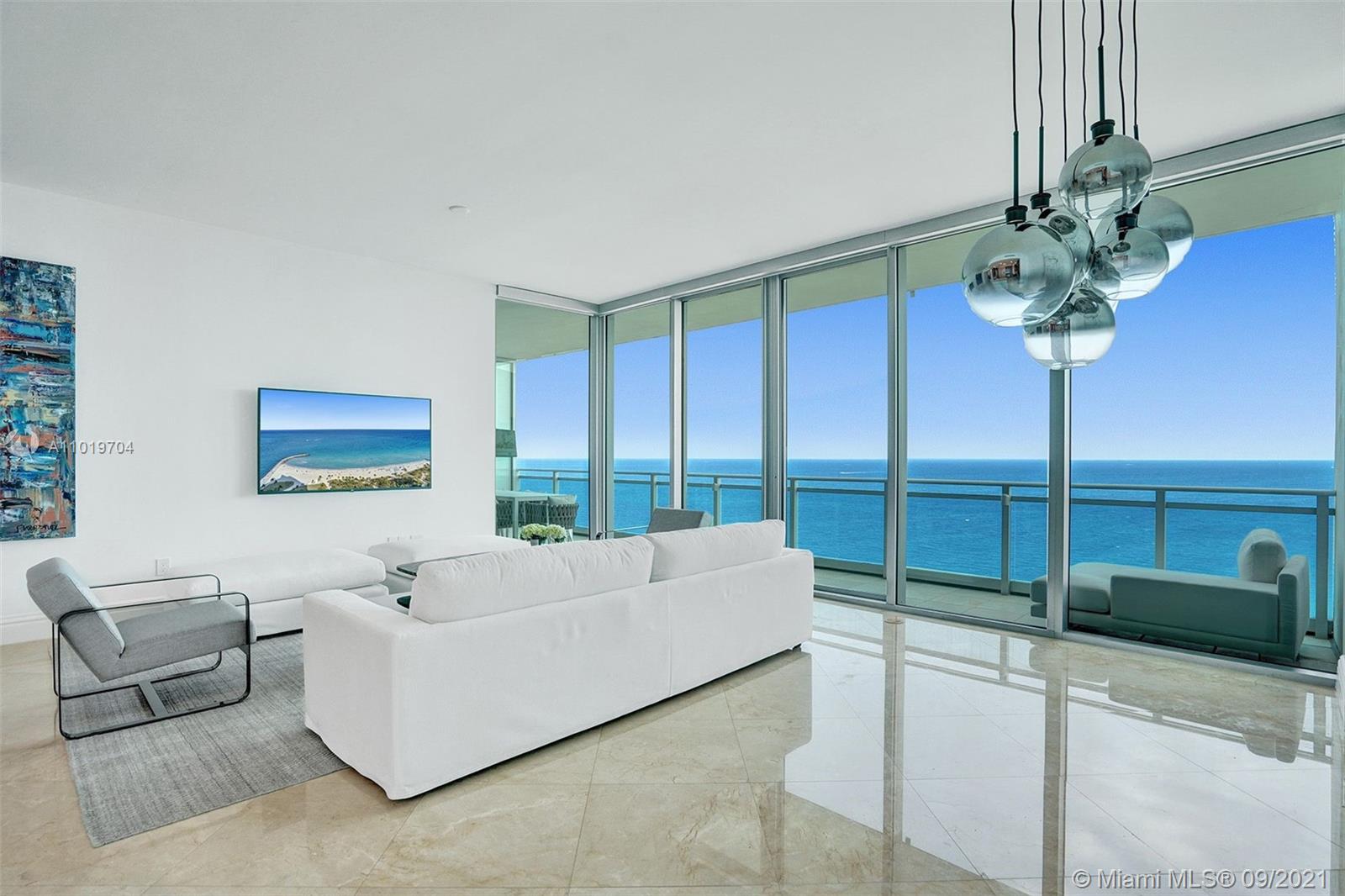 Luxurious waterfront residence with stunning south-east ,direct ocean views that has just been professionally renovated. Enjoy cooking in a state-of-the-art kitchen with new counters finished in solid-block,  genuine white-marble over Poggenpohl cabinetry + all the requisite high-end appliances. 3 Spacious bedrooms in a correct-sized unit that keeps costs down for this best-value and best-in-class offering in a Bal Harbour location .The 3rd bedroom (converted from the previous den) is complete with private closets and access to its own full bathroom with shower. Panoramic windows offer breathtaking ocean and intracoastal views, and spacious outdoor balcony & living rooms invite relaxation and carefree entertaining. Ready to move in. Ritz Carlton Hotel amenities accessible. Private Foyer.