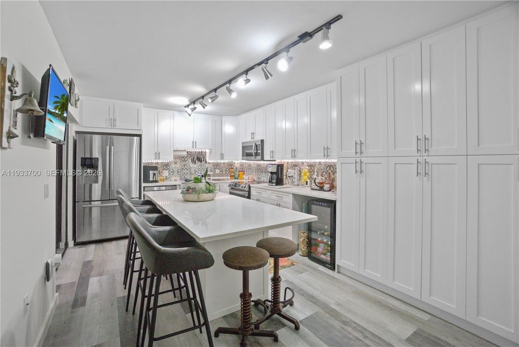 Photo of 1003 10th Ter, Palm Beach Gardens, FL 33418 (MLS # A11933700)