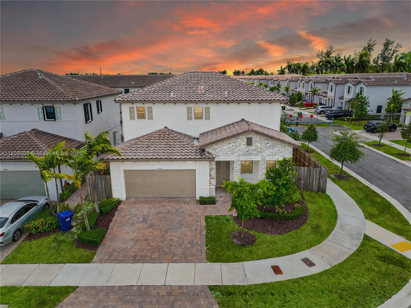 Stunning new construction two-story corner lot home with 5 bedrooms and 3 bathrooms! This spacious layout features an open floor plan connecting the living, dining, and kitchen areas. The kitchen boasts a quartz island and ample cabinet space. Two bedrooms and a full bath are located downstairs, while the large primary suite, two additional bedrooms, and a laundry room are upstairs. Enjoy the expansive, fully fenced backyard with room to build a pool. Includes two-car garage and an extended driveway. Enjoy access to exclusive community amenities, including a resort-style pool, clubhouse, exercise room, and 24-hour security. Located near charter schools, the Turnpike, Black Point Marina, shopping, dining, and the Keys. Don’t miss the 3D virtual tour. May the Force be with you!