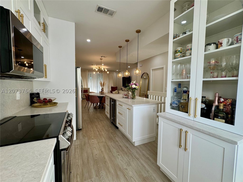 Photo of 12617 NW 14th St, Sunrise, FL 33323 (MLS # A12073764)