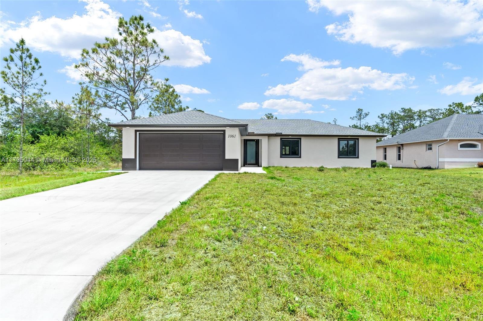 Rental Property at 1061 Butler St E St  , Lehigh Acres, Lee County, Florida - Bedrooms: 3 
Bathrooms: 2  - $1,800 MO.