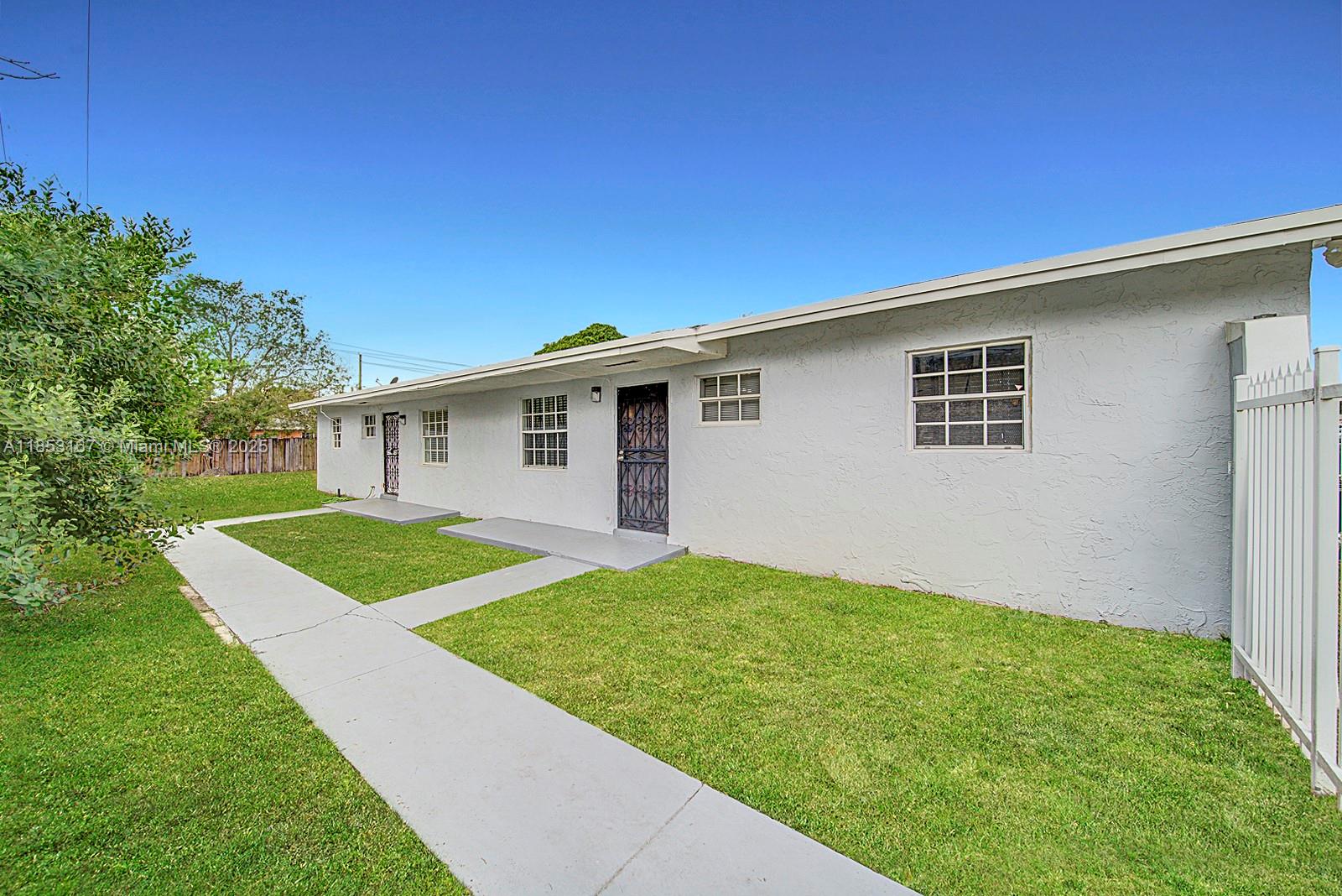 Beautiful Duplex in Miami Gardens featuring 3 Beds 1 Bath, Brand New Central AC, Huge utility room with Washer and Dryer, New Appliances, Freshly Painted, Huge Double Lot 10,349 Sqft, Private backyard with BBQ and kids trampoline, Fully gated, Security Cameras available, Yard maintance included, centrally located walking distance to shops and schools! Vacant ready to move in! FREE PETS!