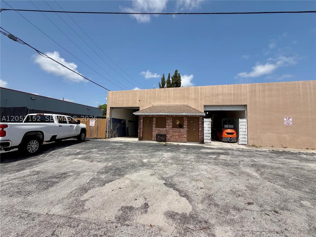 Photo of NW 23rd Way, Oakland Park, FL 33311 (MLS # A12057152)