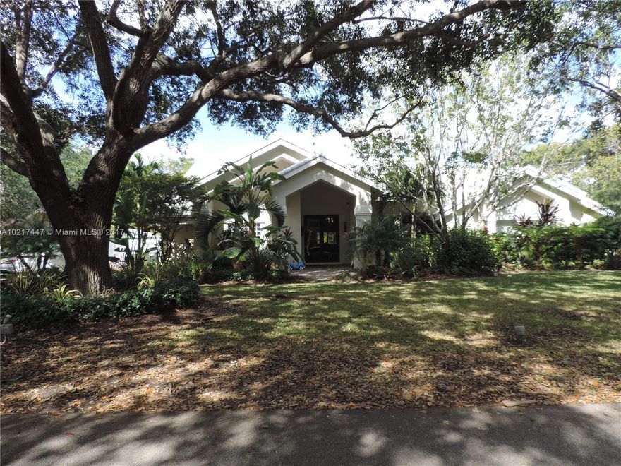 Spectacular 4/2.5 one story home located on cul-de-sac with over half an acre lot. Home was totally redone from top to bottom in 2015. Interior features European style kitchen with a very modern look. A fireplace, impact windows, French doors, vaulted ceilings , alarm and 2 zone A/C. Exterior features heated pool with plenty of space to entertain friends and family. A must see!! Call for a showing today.