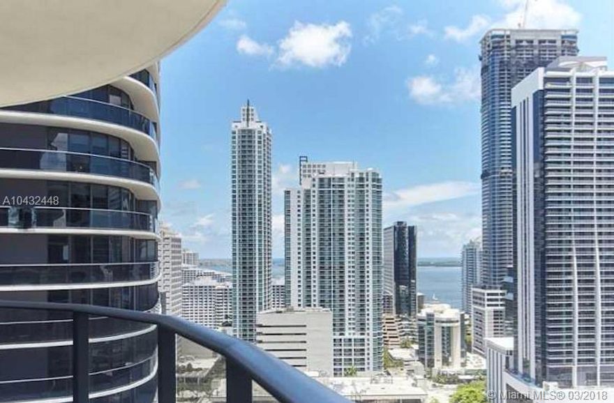 Brand NEW 2BD/2BA + den in Brickell Heights West tower in the heart of Brickell. Features built out closets, window treatments, imported wood like porcelain flooring, and a 293 sq ft wrap around terrace with stunning views with SE exposure ( best line in the building). Amenities include 9th floor pool, 2 party rooms, kids room, business center, theater, herb/veggie garden, full gym & spa, 24 hr security, valet & roof top pools. Steps away from Brickell City Centre & Mary Brickell Village. Pets welcome. 1 Year Equinox membership included. * SQ FT AS PER OWNER*