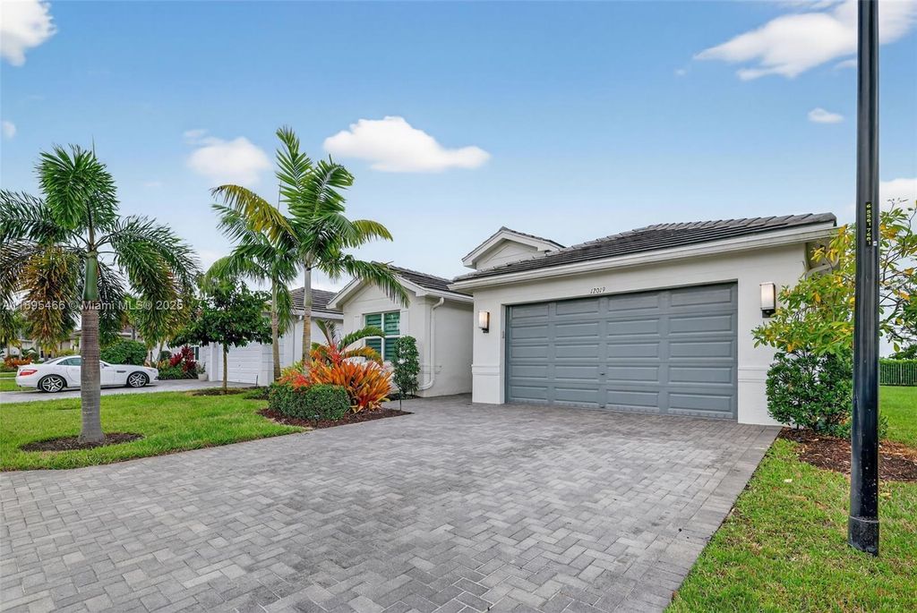 Photo of 12019 SW Seahorse Springs Ter, Port St Lucie, FL 34987 (MLS # A11895466)