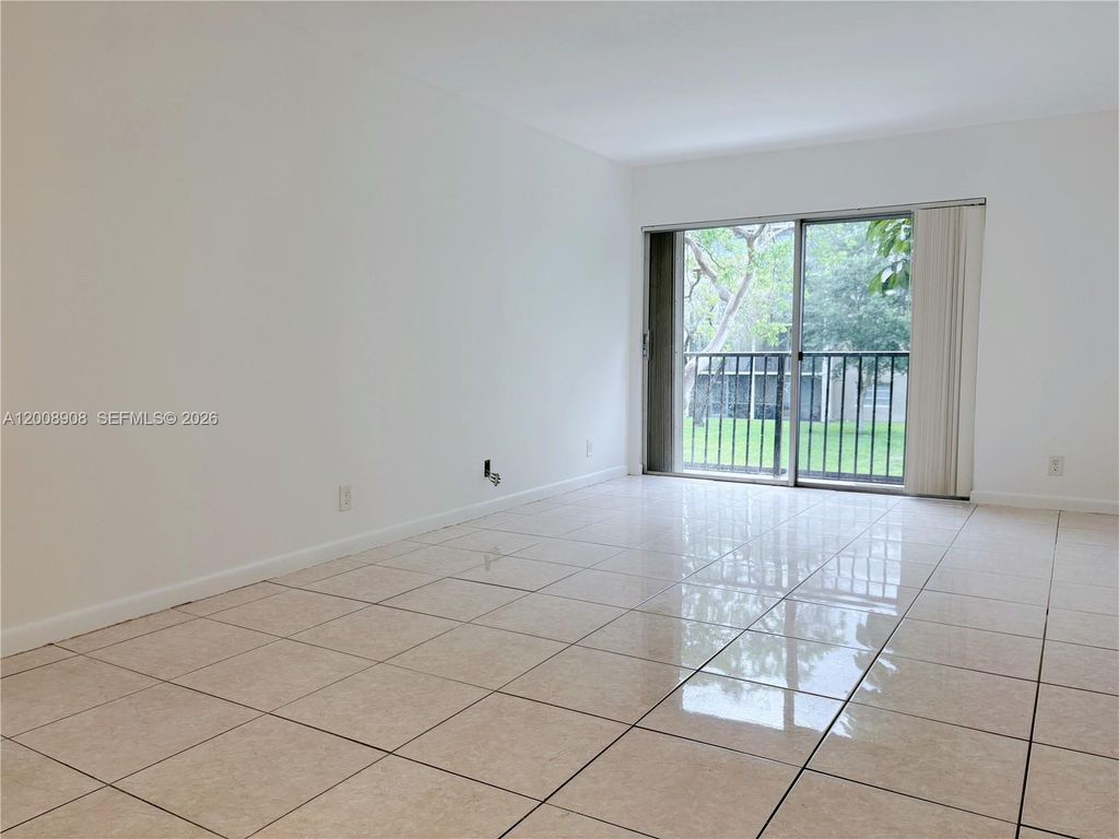 Photo of 8550 N Sherman Cir #205, Miramar, FL 33025 (MLS # A12008908)