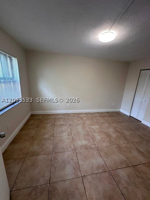 911 NE 209th Ter 102-27
