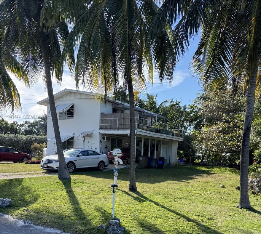 Excellent opportunity to own a two-story duplex in the heart of Marathon. Each unit offers 1 bedroom and 1 bathroom, situated on a generous 10,591 SF lot. Ideal for redevelopment, expansion, or construction of a larger duplex, subject to local approvals. Prime location near popular restaurants, Sombrero Beach, Marathon Sandbar, Florida Keys Marathon Airport, and Curry Hammock State Park. A versatile property with strong upside potential in the Middle Keys.
Verified with the City of Marathon: The property is zoned Residential-Medium, so setbacks are 20ft from the front and back and 5ft from the sides with a requirement of 20% open space, and the building has a height limit of 42ft.  No Rogo points needed for building.