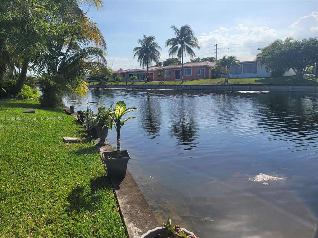 Photo of 4519 NW 49th Dr, Tamarac, FL 33319 (MLS # A11863905)