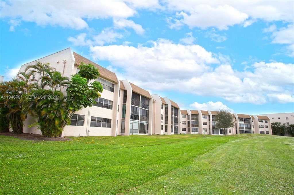 Photo of 2941 N Nob Hill Rd #208, Sunrise, FL 33322 (MLS # A11946791)