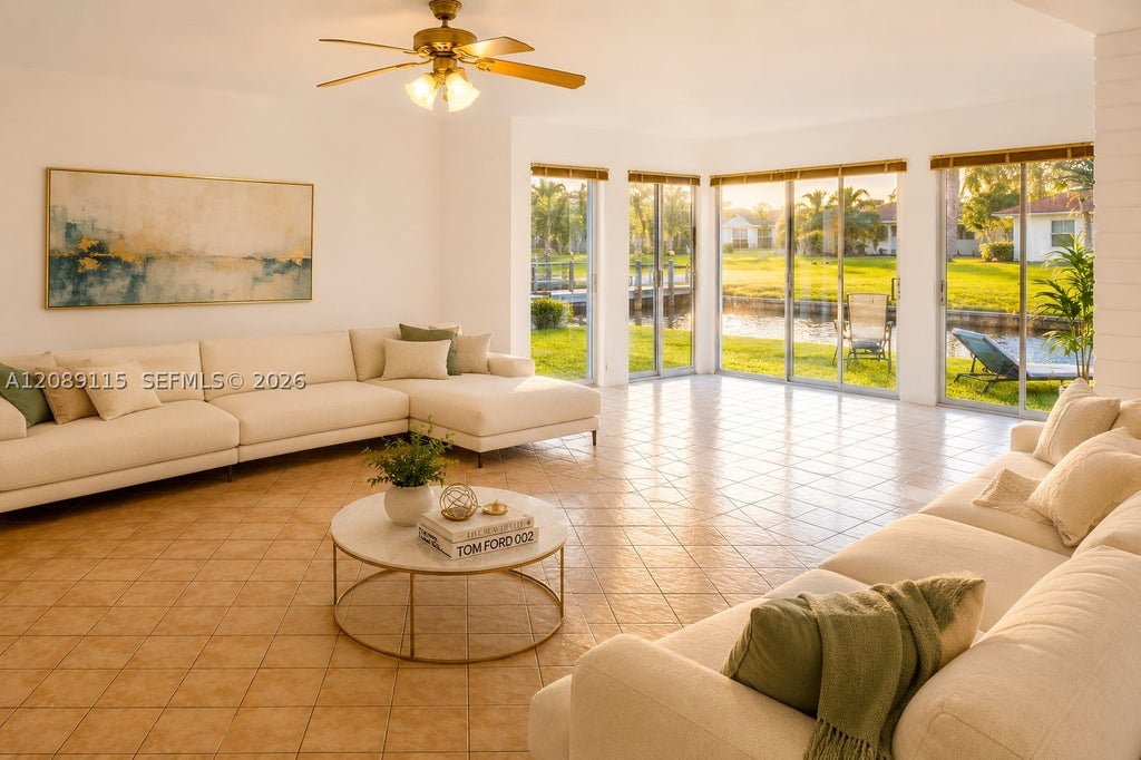 Photo of 5700 White Hickory Cir, Tamarac, FL 33319 (MLS # A12089115)