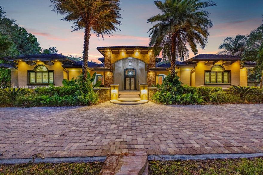 Situated on a builder’s acre in Nutmeg Estates near Baptist Hospital, this custom-designed 4-bedroom, 4.5-bathroom home with an office/den offers elegance & comfort. High-end finishes include marble floors, solid wood doors, custom built-ins & wood ceiling beams. The 20' Great Room with a double-sided fireplace flows into a spacious dining area & chef’s kitchen with a large island, breakfast nook & soaring ceilings. The outdoor space features a covered patio, summer kitchen, lagoon-style pool with waterfall & spa, plus a cabana bath. The primary suite offers a spa-like bathroom & walk-in closet. Other features include a large circular driveway, a 2-car garage & a separate 1-car garage. Set on a beautifully landscaped 39,073 sq. ft. lot with mature live oaks, it offers both privacy & charm.