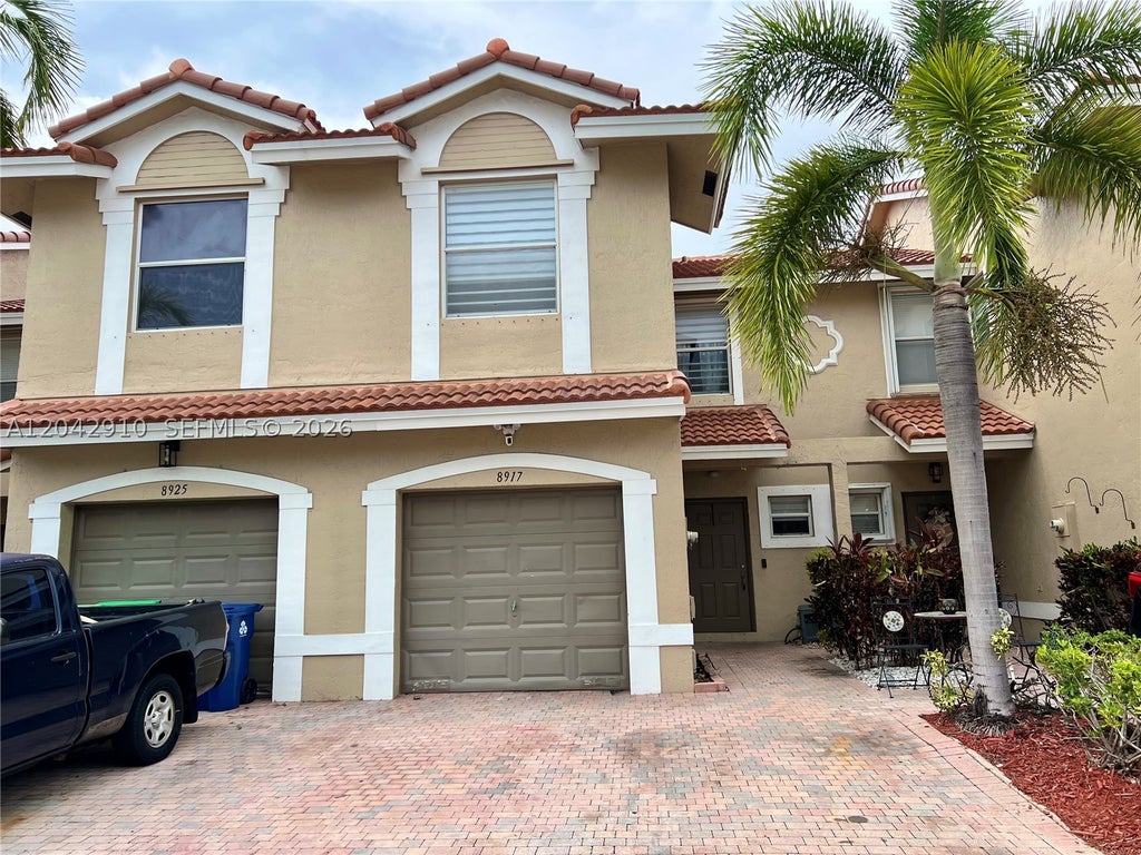 Photo of 8917 NW 54th St, Sunrise, FL 33351 (MLS # A12042910)