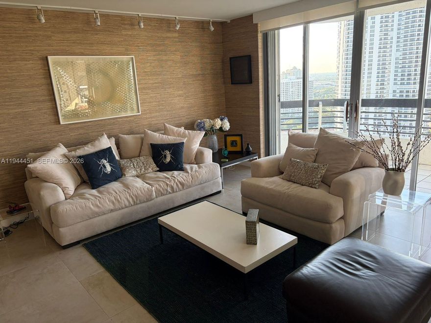 Stunning 2-Bedroom, 2-Bathroom + Den Condo in Aventura's desirable Mystic Point. 
Beautifully furnished and filled with natural light, this 2-bedroom, 2-bathroom condo offers breathtaking Intracoastal and golf course views in one of Aventura’s most desirable locations. Enjoy resort-style living with amenities including a pool, tennis courts, gym, mini market, on-site restaurant, and a scenic boardwalk. The spacious, light-filled interior features stylish finishes and a modern open layout. Located minutes from top shopping, dining, and the beach, this home is perfect for those seeking luxury and convenience. Don’t miss this opportunity—schedule your showing today! Available for short term rental price will vary based on length of rental.