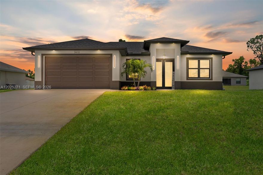 Welcome to this stunning new construction home in the heart of Lehigh Acres, where modern design meets high-end finishes. This 3-bedroom, 3-bathroom, 2 car garage residence offers an open -concept layout with high tray ceiling, oversized porcelain tile throughout, all-around impact-resistant windows and doors, French doors and sprinkler system. The chefs Kitchen is the centerpiece of the home showcasing custom-made white laminate cabinets reaching the ceiling with elegant glass doors and Quartz countertops and backsplash, equipped with high-end stainless-steel appliances, it features a spacious central island and a bright view to the outdoors.
It's a modern, welcoming space, perfect for enjoying with family or guests. The primary suite offers privacy and style, complete with tray ceiling and a spa inspired  bathroom featuring dual vanities, LED light mirror, gold fixtures and a frameless glass walk-in shower with floor-to-ceiling tile. The house features a two-car garage with an epoxy floor finish. The garage includes the homes third bathroom offering convenience. Additionally, it comes equipped with plumbing and electrical connections, making it ideal if you wish to convert it into a guest apartment or in-law suite. Easy access to Fort Myers, I 75, short distance to RSW International Airport, close to school, shops, restaurant, etc....
Don' t miss the chance to make it yours- schedule a private showing today!