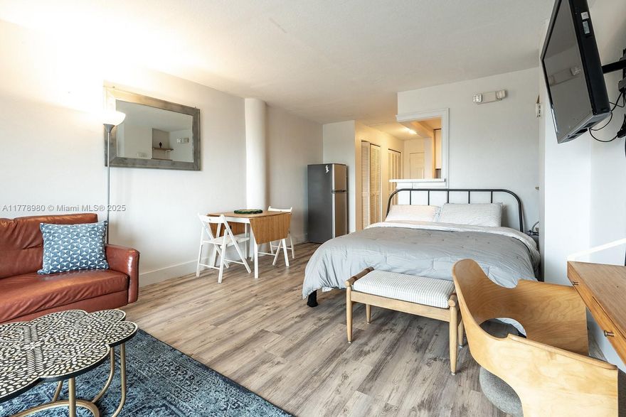Beautiful first floor studio in the North Bay Village area of Miami. The kitchen has been updated with white hardwood cabinets and stainless steel appliances throughout. The unit has an open balcony facing the pool deck. One of the few buildings in North Bay Village that allow 30-day rentals and short-term rentals (Airbnb & Vrbo ) with a certificate of use license.
