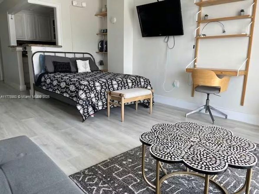 Beautiful first floor studio in the North Bay Village area of Miami. The kitchen has been updated with white hardwood cabinets and stainless steel appliances throughout. The unit has an open balcony facing the pool deck. One of the few buildings in North Bay Village that allow 30-day rentals and short-term rentals (Airbnb & Vrbo ) with a certificate of use license.