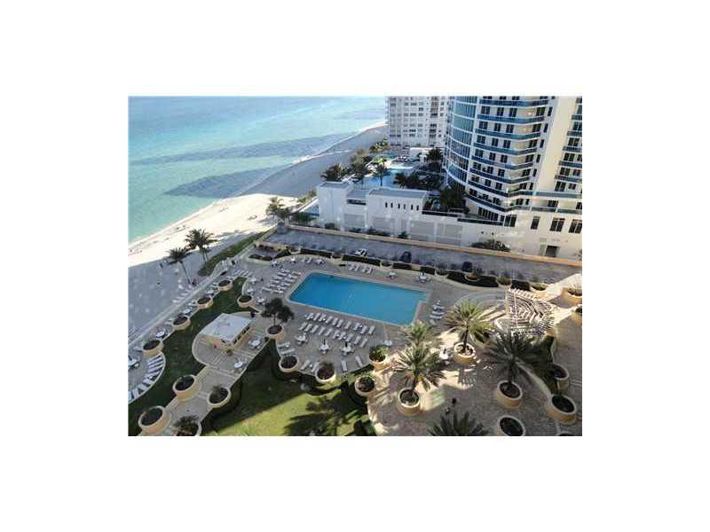 Beautiful direct Ocean views from this high rise apartment. Oceanfront Luxury building on Hollywood Beach, steps from the Westin Diplomat Hotel. This condo feautures 1Bedroom, 1 bathroom, huge walk-in closet, modern kitchen with newer appliances, includi ng washer and dryer, laminate floors throughout. Fully furnished. Open balcony with amazing views of the Atlantic Ocean. Full service building with 24hr. security, valet parking, gym, yoga room, convenience store in the mezzanine. Available