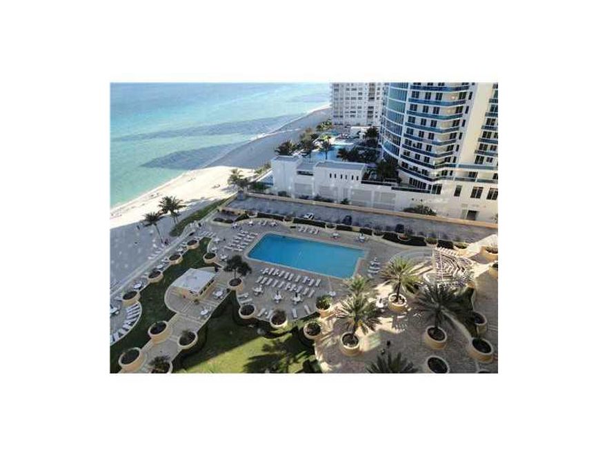 Beautiful direct Ocean views from this high rise apartment.  Oceanfront Luxury building on Hollywood Beach, steps from the Westin Diplomat Hotel. This condo feautures 1Bedroom, 1 bathroom, huge walk-in closet, modern kitchen with newer appliances, includi ng washer and dryer, laminate floors throughout.  Fully furnished.  Open balcony with amazing views of the Atlantic Ocean.  Full service building with 24hr. security, valet parking, gym, yoga room, convenience store in the mezzanine.  Available