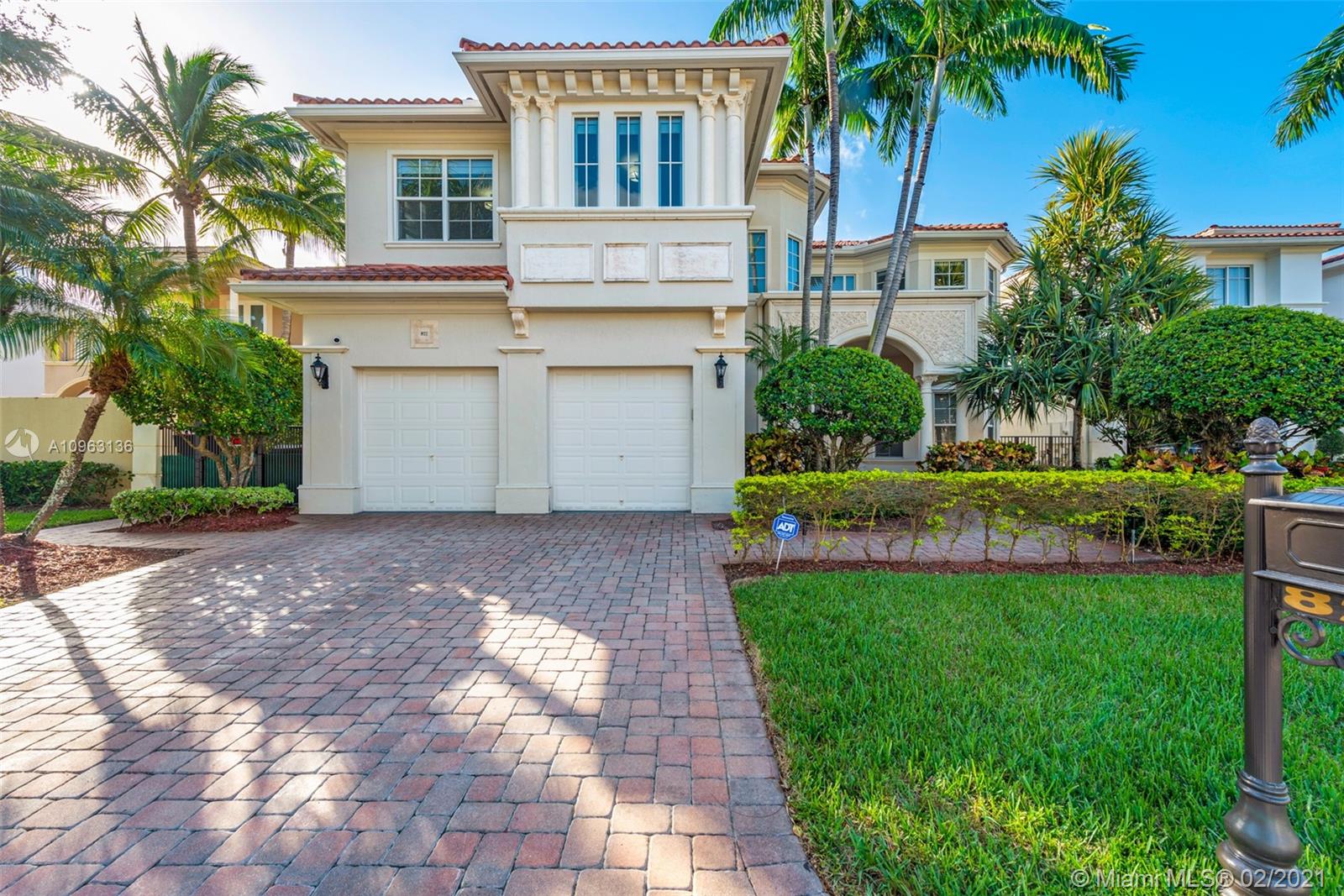 Harbor Islands contemporary style home in Grand Harbor Estates.   Large backyard with built in summer kitchen, pool, covered terrace, great for entertaining and offering lots of privacy.  Interior features lots of natural lighting, volume ceilings, impact windows and doors.  Stunning ample master suite featuring a separate sitting room and spa inspired master bath.   Fully equipped gourmet kitchen, formal dining room and breakfast area.  Great street position, 2 car garage and all the amenities including gym, clubhouse, marina, gated entry and much more.