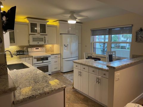 Photo of 281 S Hollybrook Dr #50-205, Pembroke Pines, FL 33025 (MLS # A11988257)