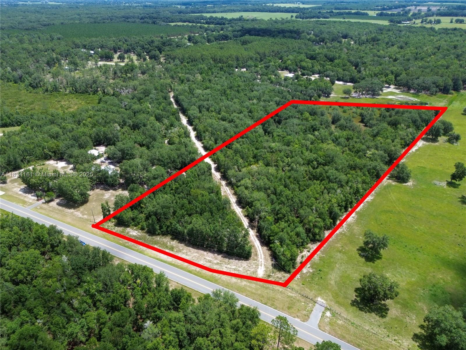 Embrace the freedom to build your dream home on this serene rural land of 10.06-acres, a wooded haven in Buckhead Woods, Fort White. Nestled in nature with no restrictive HOA, yet part of the Three Rivers Estates community, you'll enjoy exclusive access to private parks, boat ramps, and river fun for just $175/year. Zoned for top-rated schools, this location offers a balance of privacy, adventure, and accessibility, just a short drive from Ichetucknee Springs, the Santa Fe River, and Lake City and 40 minutes from the University of Gainesville. Picture gardens, animals, and outdoor living—your countryside lifestyle begins here!